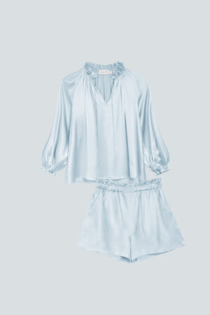 Sophia Ruffle Trim Blouse and Shorts Set in blue with delicate ruffle details and relaxed fit for a breezy, elegant style.