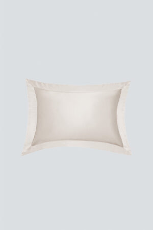 MANITO Authentic Silk Pillowcase Set in ivory laid flat, showcasing the wide border design and silky finish.