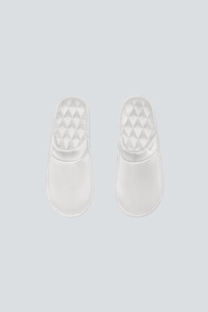 Top view set of white Authentic Women's Silk Lounge Shoes, lamb-leather piping frames the satin upper and quilted footbed.