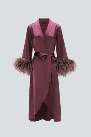 Red long robe made from 22 momme charmeuse silk with delicate feather cuffs, perfect for gifting or holiday events.