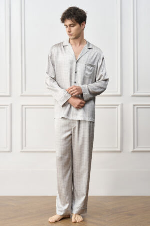 Greywake Men's Pajama Set flat lay, featuring tonal grey check patterns with refined piping and modern tailoring.