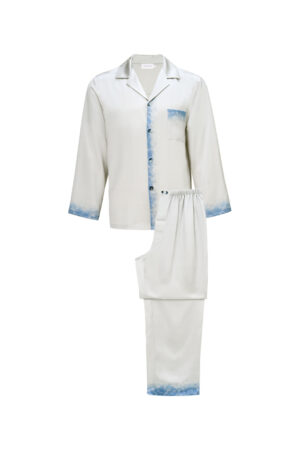 Flat lay of Inkmark Men's Pajama Set with ocean-blue edges, radiating understated elegance and cozy sophistication.