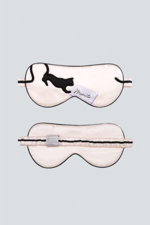 Front and back view of light pink MANITO cat eye mask featuring black cat silhouette and comfortable elastic band.