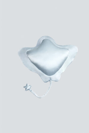 The best MANITO Manta pillow for kids placed in a plain background, adding a touch of ocean-inspired decor.