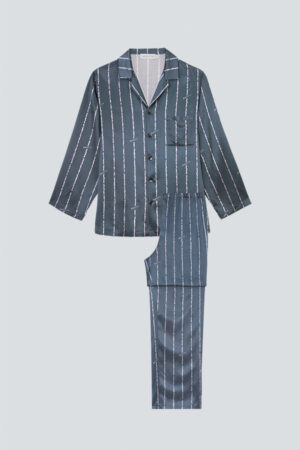 Flat lay of MANITO Ocean Stripe Men's Pajama Set featuring full button shirt and long pants with minimal vertical white stripes.
