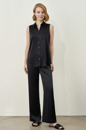 Full-body view of MANITO Passion Women's Silk Trousers in black, paired with matching sleeveless silk top.