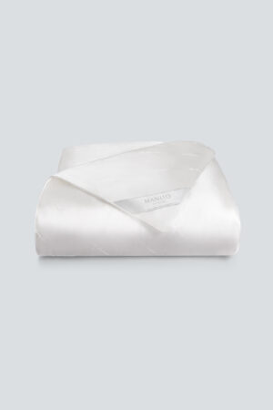 Gleam Silk Filled Duvet for all seasons, luxurious and hypoallergenic with Manito branding.