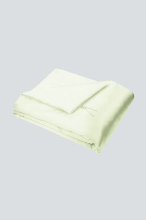 Light green Silk Throw Blanket folded neatly with tie detail visible.