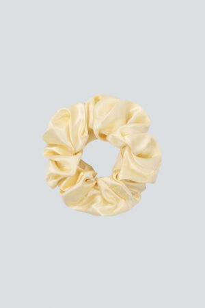 Butter-yellow Thick Silk Scrunchie adds a soft, sunny note and a secure, comfy grip.