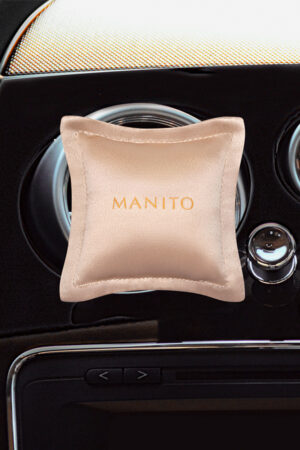 MANITO Silk Sachet Set displayed in a car interior, featuring a luxurious silk pouch with the MANITO logo.