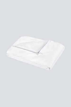 Classic white Silk Throw Blanket folded flat with smooth satin texture.
