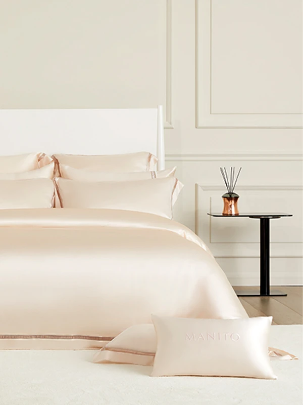 MANITO's elegant silk bedding sets designed for a luxurious sleep experience.