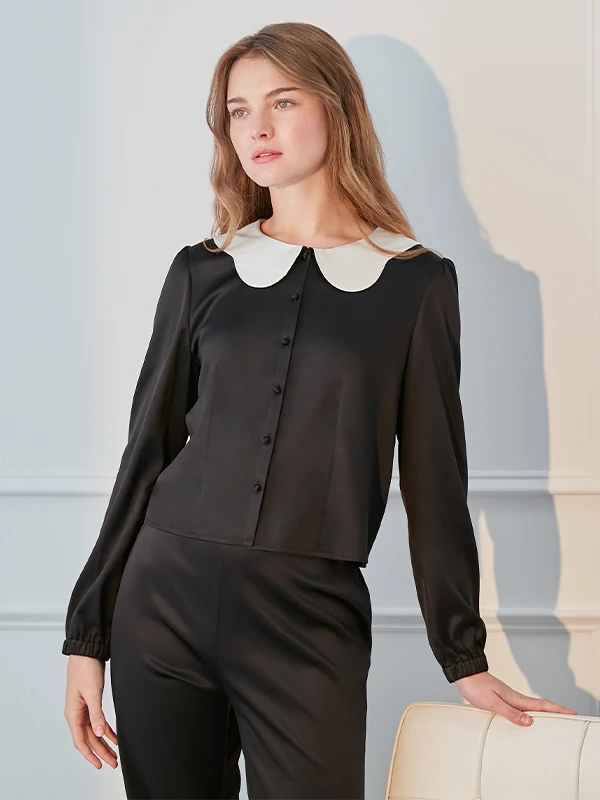 MANITO's Doll Loungewear Set features a playful design with soft silk fabric, perfect for relaxation.