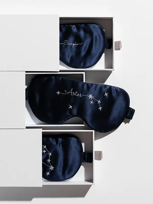A selection of MANITO's silk accessories, including eye masks and scrunchies.