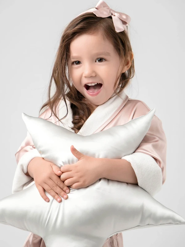 MANITO's soft silk accessories for kids, including eye masks and scrunchies.